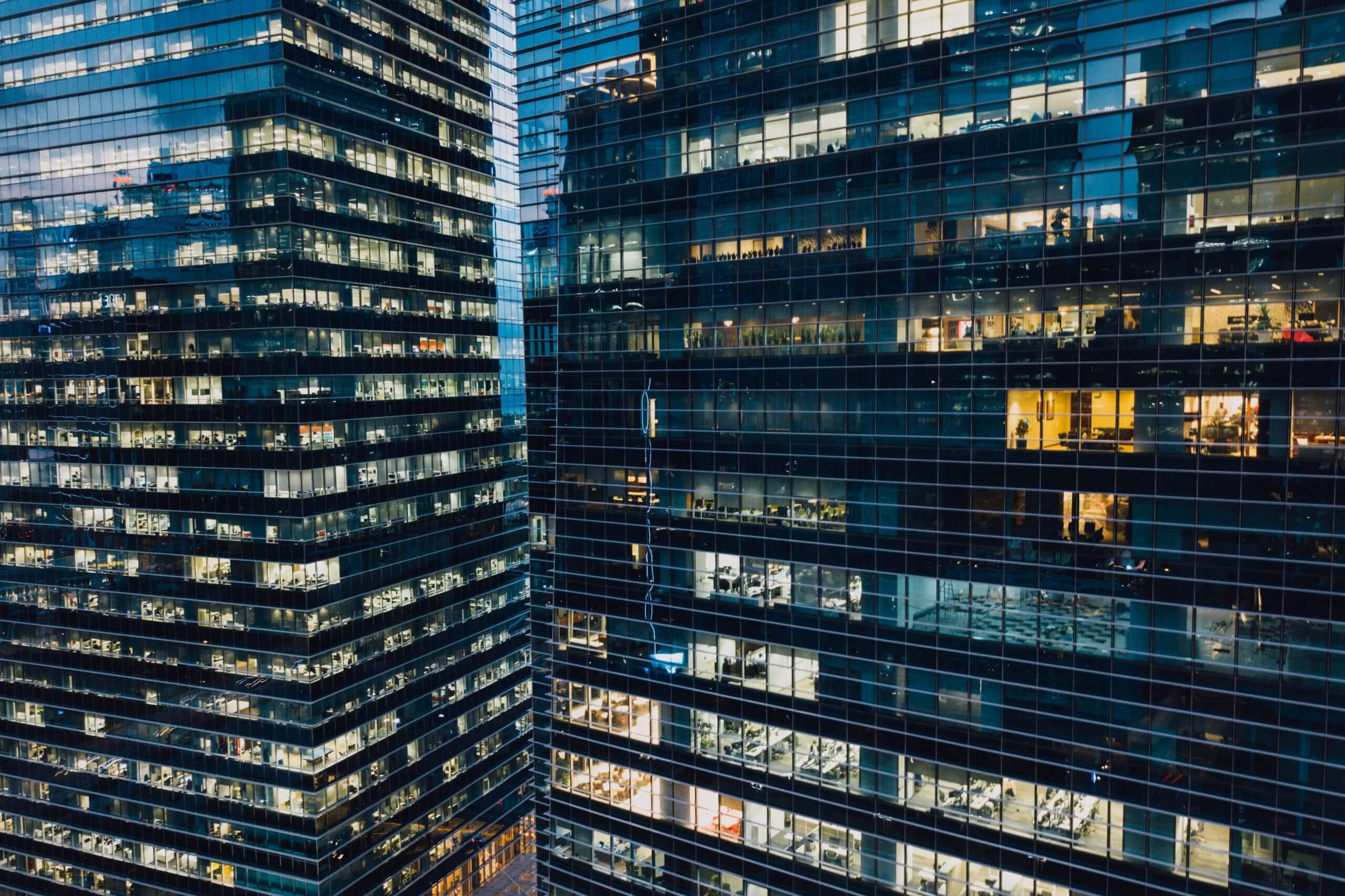 Modern office buildings, representing organisations meeting Australia’s security and compliance frameworks.
