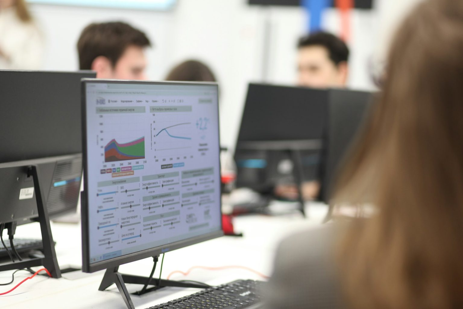 Analysts working in a government office