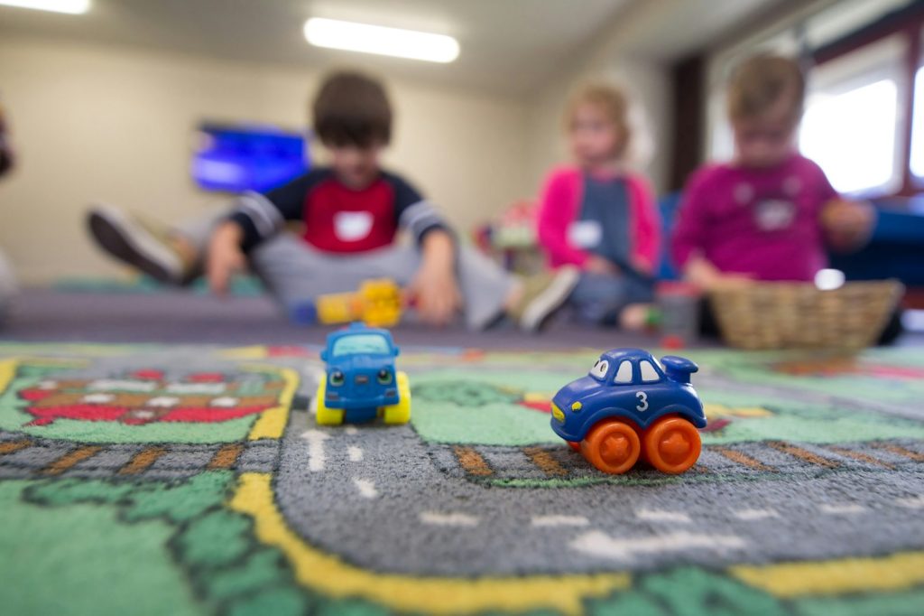 Children playing with toys at an early learning centre