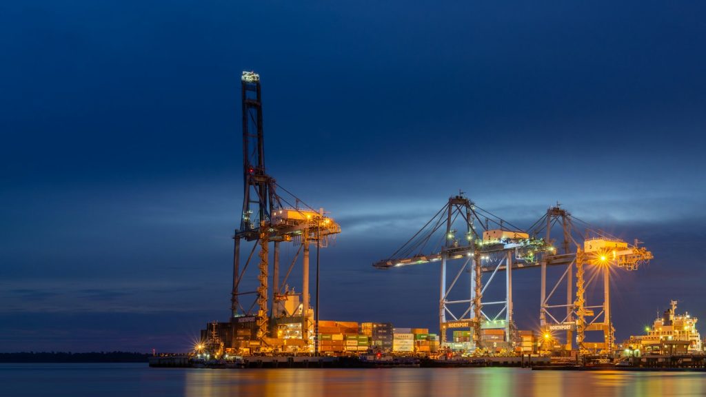 Container terminal cranes at night