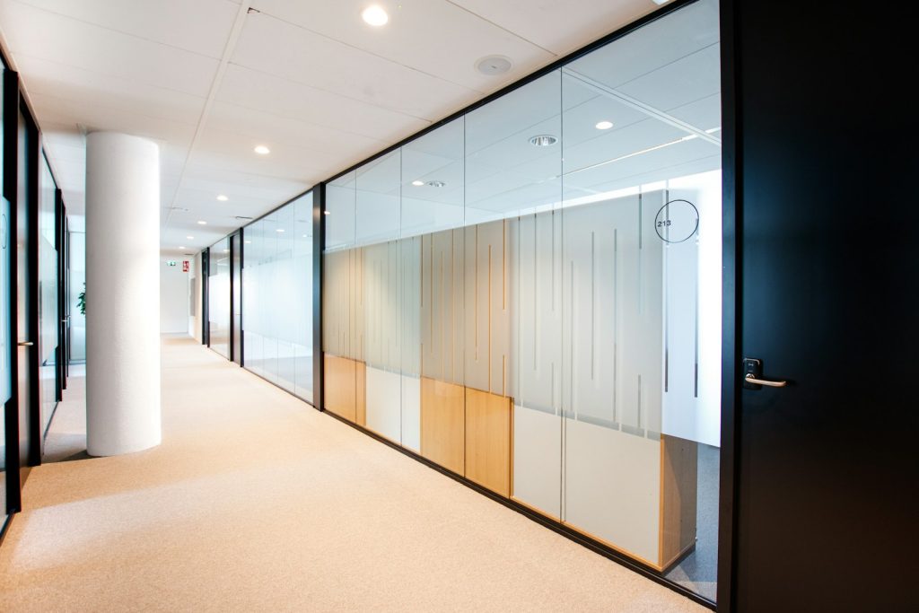Office corridor with glass walls
