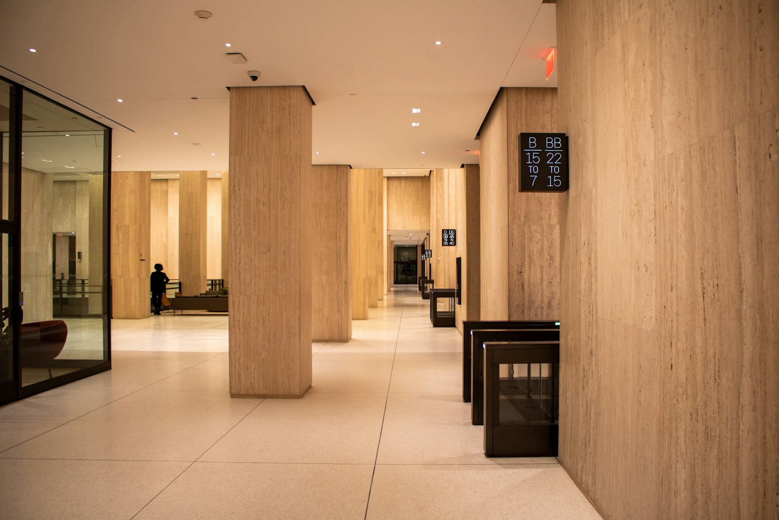 Security gates controlling staff access in an office lobby