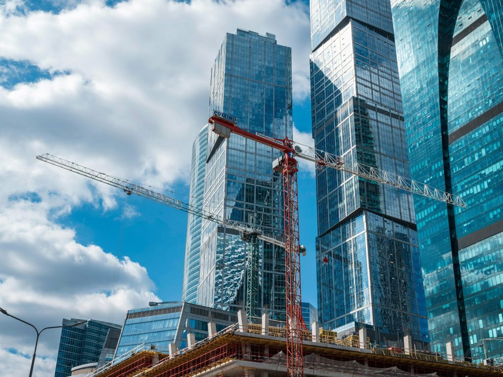 Office tower under construction with cranes