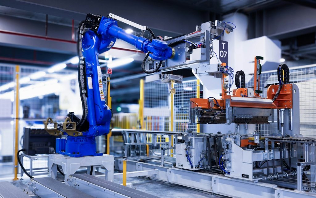 Robotic arms on a manufacturing line